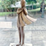 Isabel miramontes contemporary bronze sculpture abstract art angel sculpture a beautiful girl in surprise of her dress blows up by wind
