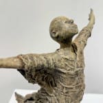 IIXV Lieven d'Haese contemporary bronze sculpture of a boy opening his arm against the wind to embrace a new adventure. A child's sculpture, a sculpture of childhood dreams. Art Yi art gallery in Brussels.