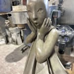 Angel passes Isabel miramontes dancing girl sculpture monumental sculpture garden sculpture contemporary bronze sculpture a beautiful girl in surprise of her dress blows up by wind Art Yi gallery Brussels art gallery