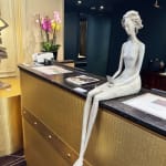 answer me woman sculpture Hedwige Leroux contemporary sculpture bronze sculpture woman with hair blowing into the wind interior design at hotel Barsey by Warwick Art Yi gallery Brussels art gallery