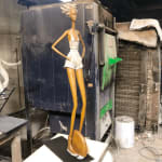 urban freedom hedwige leroux a beautiful and fine contemporary city girl bronze sculpture walking on street