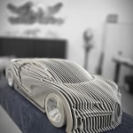 Chirona silver luxury racing car sculpture Jean Paul Kala contemporary car sculpture Art Yi gallery Brussels art gallery