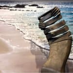 Isabel miramontes contemporary bronze sculpture abstract art sculpture decoration design minimalism intimidad a naked woman sculpture taking out of her swimming suite at seaside garden sculpture