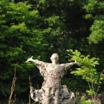IIXV lieven d'haese contemporary bronze sculpture a boy opening up his arm against wind to embrace a new adventure child sculpture childhood dream sculpture garden sculpture garden art design Art Yi art gallery in brussels