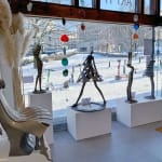 Isabel miramontes contemporary bronze sculpture abstract art sculpture decoration design minimalism intimidad a naked woman sculpture taking out of her swimming suite at seaside