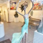 Moonlight dancing girl sculpture of Hedwige Leroux contemporary bronze sculpture dancer woman sculpture a girl in a green dress dancing freely Art Yi gallery in Brussels