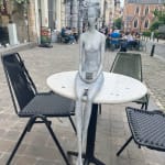 answer me hedwige leroux contemporary sculpture bronze art beautiful and fine woman watching on her smartphone and waiting for a reply art yi art gallery brussels