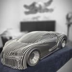 Chirona silver luxury racing car sculpture Jean Paul Kala contemporary car sculpture Art Yi gallery Brussels art gallery