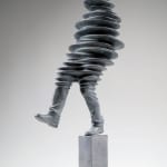 Walkman contemporary sculpture Liang Binbin a light grey bronze sculpture of a man walking and jumping in the rain with shadow figurative sculpture Art Yi gallery Brussels art gallery