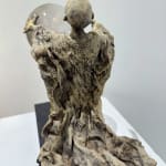 Visionary XL with light boy sculpture bronze sculpture of Lieven d'Haese garden sculpture boy opening arms to light up a light bulb in his hands with imagination magic dream contemporary art sculpture light interior design at Art Yi gallery in Brussels