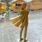 Angel passes Isabel miramontes dancing girl sculpture monumental sculpture garden sculpture contemporary bronze sculpture a beautiful girl in surprise of her dress blows up by wind Art Yi gallery Brussels art gallery