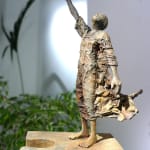 Eureka lieven d'haese hedendaagse bronzen sculptuur een jongen die rent met een puzzel sculptuur kind sculptuur jeugd Art Yi kunstgalerie in brussel