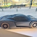 Porsche fancy blue racing car sculpture Jean Paul Kala contemporary sculpture car lover Art Yi gallery Brussels art gallery