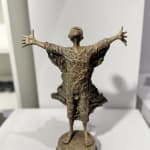 IIXV Lieven d'Haese contemporary bronze sculpture of a boy opening his arm against the wind to embrace a new adventure. A child's sculpture, a sculpture of childhood dreams. Art Yi art gallery in Brussels.
