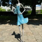 Fifth avenue contemporary woman sculpture Hedwige Leroux a young girl under a blue dress blowing in the wind while carry a little dog in her bag bronze sculpture Art Yi gallery Brussels art gallery