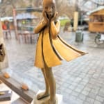 Angel passes Isabel miramontes dancing girl sculpture monumental sculpture garden sculpture contemporary bronze sculpture a beautiful girl in surprise of her dress blows up by wind Art Yi gallery Brussels art gallery