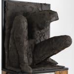 Ceramic relief in black clay in sculptor Emilio DiIorio's Women of Troy series.