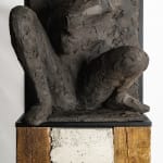 Ceramic relief in black clay in sculptor Emilio DiIorio's Women of Troy series.