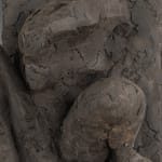 Ceramic relief in black clay in sculptor Emilio DiIorio's Women of Troy series.