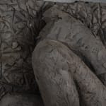 Ceramic relief in black clay in sculptor Emilio DiIorio's Women of Troy series.