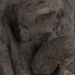 Ceramic relief in black clay in sculptor Emilio DiIorio's Women of Troy series.