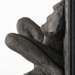 Ceramic relief in black clay in sculptor Emilio DiIorio's Women of Troy series.