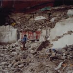 It is a video still from Farewell Poem 2002 that reveals a ruined construction site .