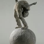 A body bends his body and stands on a ball.