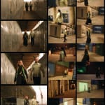 Two people in modern outfit go across a construction site.