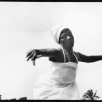 Chester Higgins, Sunrise prayer on Osu Beach, Accra, Ghana, 1973
