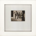 André Kertész, Group of four men in trunks sitting on a ramp, 1914