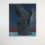 Painting titled “Driftwood” (2022) by Silvia Giordani. The artwork features a monumental piece of driftwood with intricate textures, set against a gradient sky transitioning from deep blue to red, and surrounded by an icy foreground. Acrylic and oil on canvas. © Buysse Gallery.