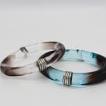 Marlene McKibbin, Acrylic Bangle with Silver Rings - Chocolate & Clear, 2025