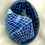 dyed egg showing edge of blue bed