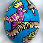 dyed egg showing octopus tentacles with purple bird