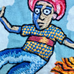 detail of embroidery showing people floating and flying in air