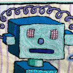detail of embroidery showing robot head