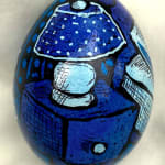 dyed egg showing blue table lamp