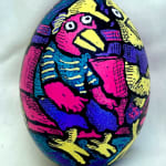 dyed egg showing bright pink, blue and yellow bird sitting on subway bench