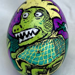 Pysanky egg showing dinosaur in a barber shop