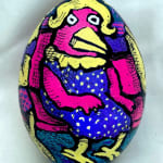 dyed egg showing bright pink, blue and yellow bird sitting on subway bench