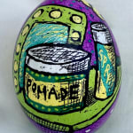 Pysanky egg showing pomade jar