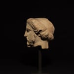SOUTH ITALIAN GREEK, Fragmentary Head of a Bearded God, South Italian Greek, c. 4th century BC