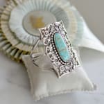 Jill Garber, Very fine recessed in black jet 19th Century tesserae micro mosaic cuff bracelet with green Royston turquoise surround