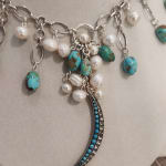 Jill Garber, Very fine natural 19th Century rose cut bohemian garnet locket festoon necklace with a rare collection of hand...