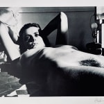 Helmut Newton, Woman in Coat Adjusting Stocking, Paris 1975, 1978
