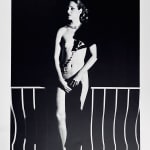 Helmut Newton, Woman in Coat Adjusting Stocking, Paris 1975, 1978