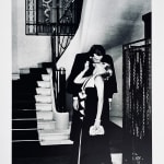Helmut Newton, Woman in Coat Adjusting Stocking, Paris 1975, 1978