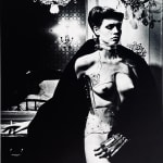 Helmut Newton, Woman in Coat Adjusting Stocking, Paris 1975, 1978