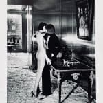 Helmut Newton, Woman in Coat Adjusting Stocking, Paris 1975, 1978